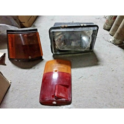 M243 XX - STOCK RICAMBI FIAT 127 PANORAMA - FIORINO - USATI - FANALE ANTERIORE 