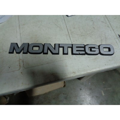 M8044 XX - SCRITTA LOGO STEMMA EMBLEM EMBLEMA FREGIO AUSTIN MONTEGO